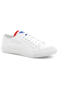 White sneaker with red and blue accents on a white background