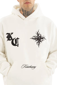White hoodie with black designs and text on a white background