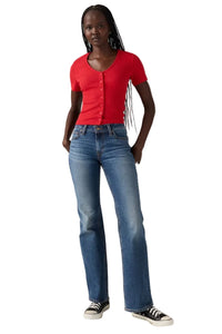 Person wearing a red shirt and blue jeans on a white background