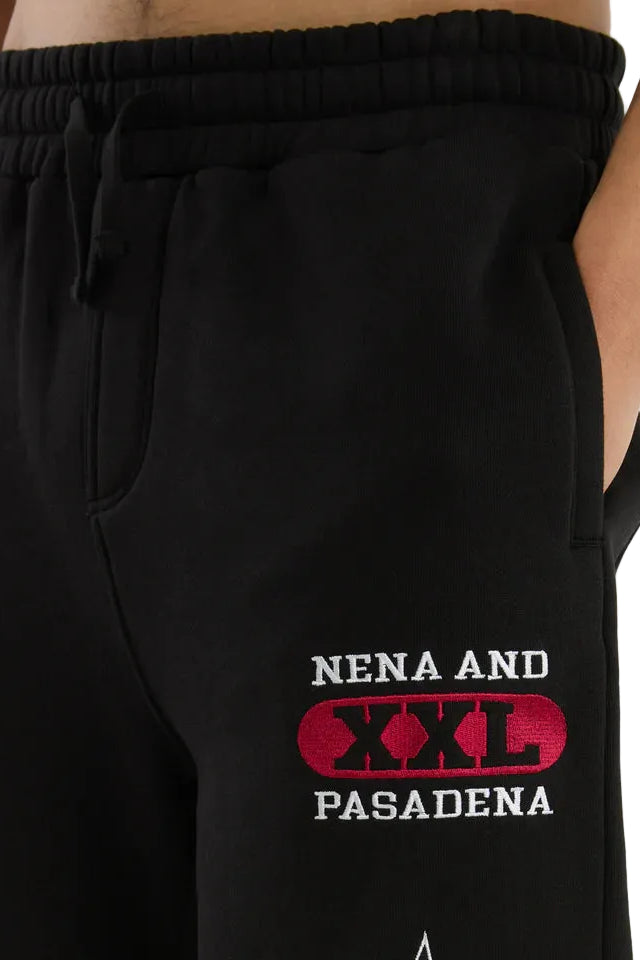 Black sweatpants with 'Nena and XXL Pasadena' text on a white background