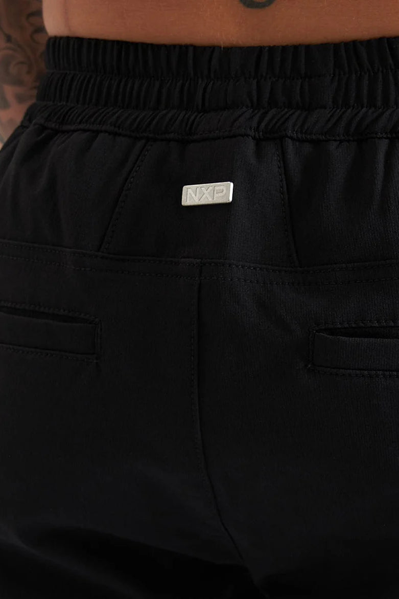 Black pants with a brand logo on a white background