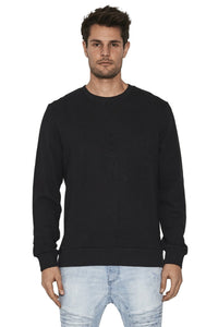 A male model wearing a black crew neck sweatshirt with no visible brand marking.